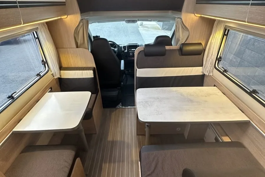 Inside the Explorer Compact RV rental Iceland – kitchen and living area